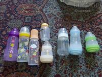 Lot of used baby bottles