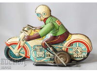 Vechi model de jucărie mecanică din metal, bicicletă cu motociclist