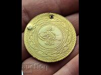 A rare gold coin, the pendara