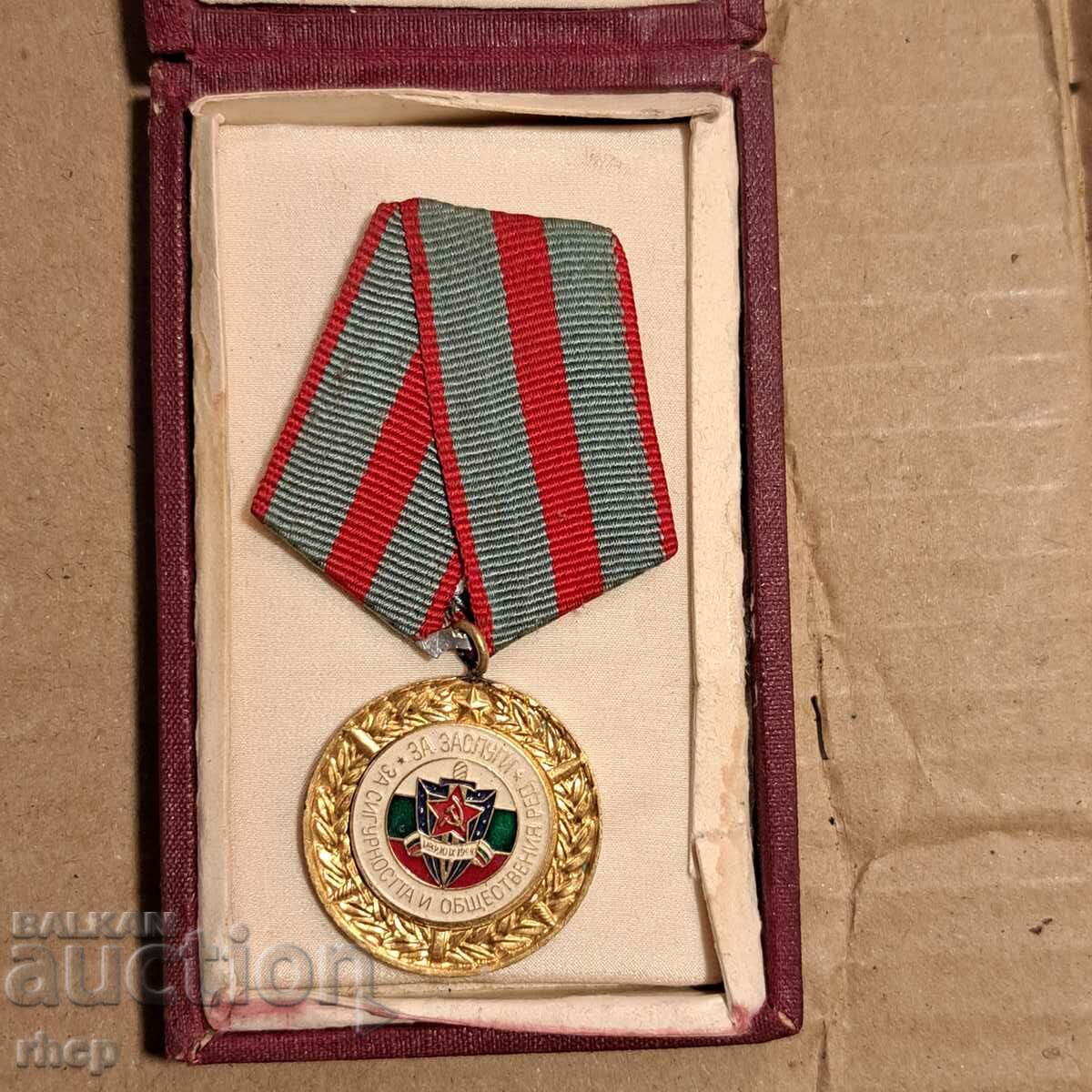 Medal for merits of the Ministry of Interior of the NRB with a box
