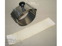Stainless steel absorbent press with bakelite handle