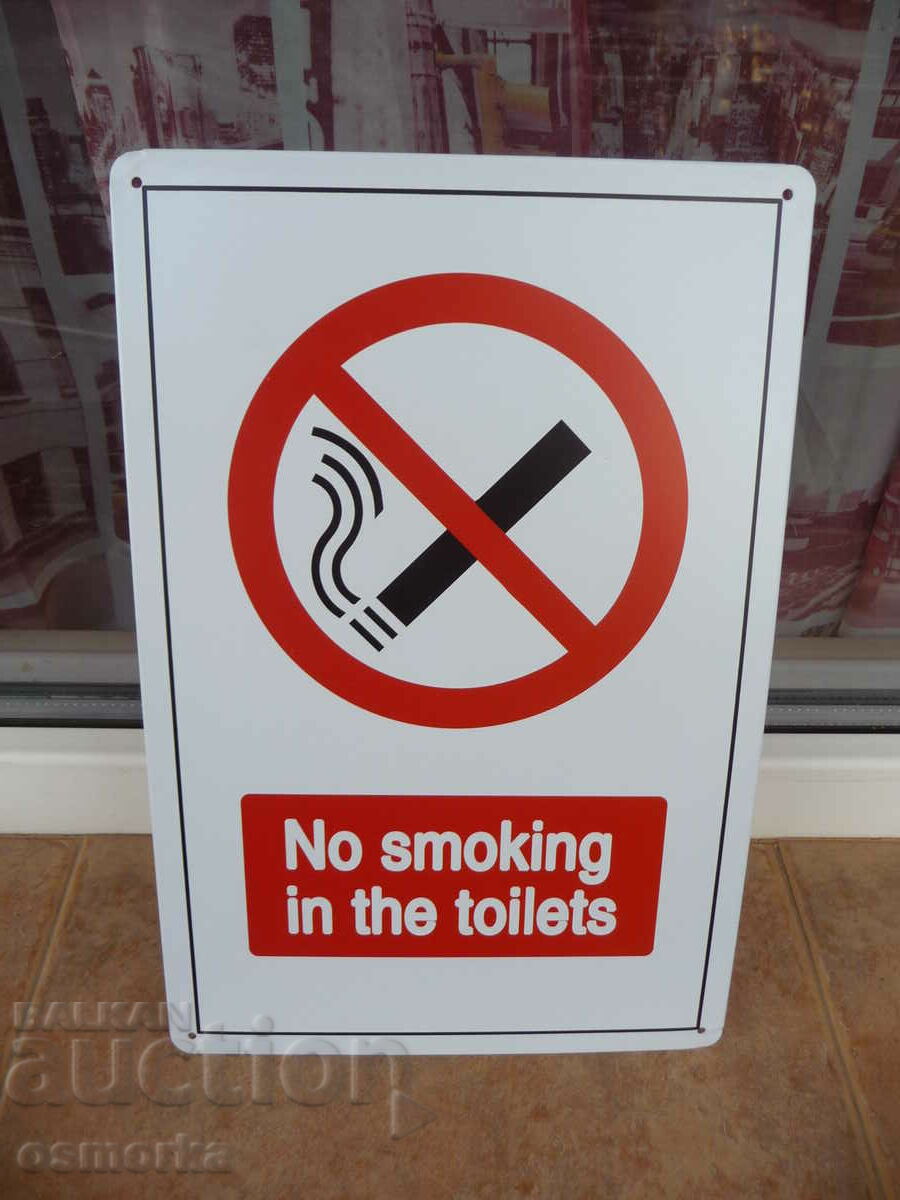 Metal plate inscription Do not smoke in the toilets cigarettes toilet
