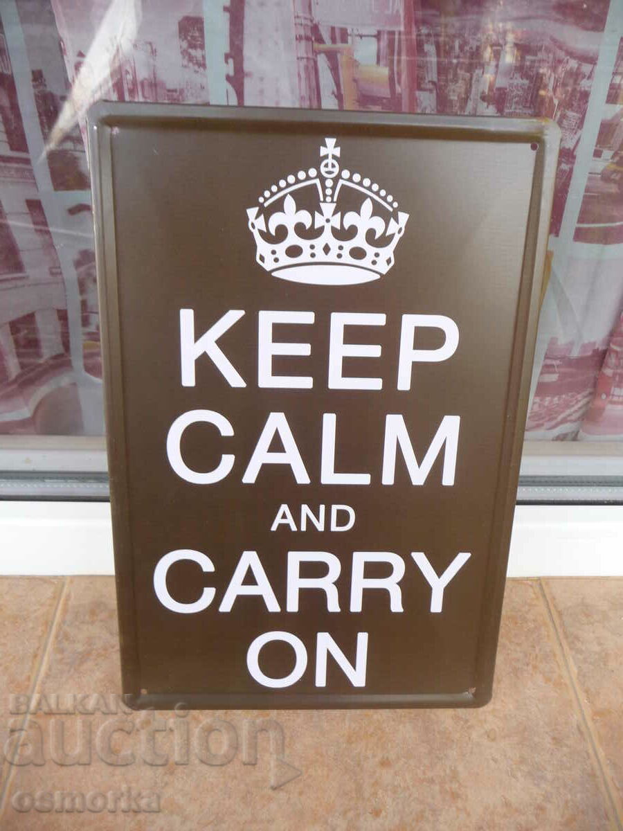 Metal sign saying Keep calm and carry on
