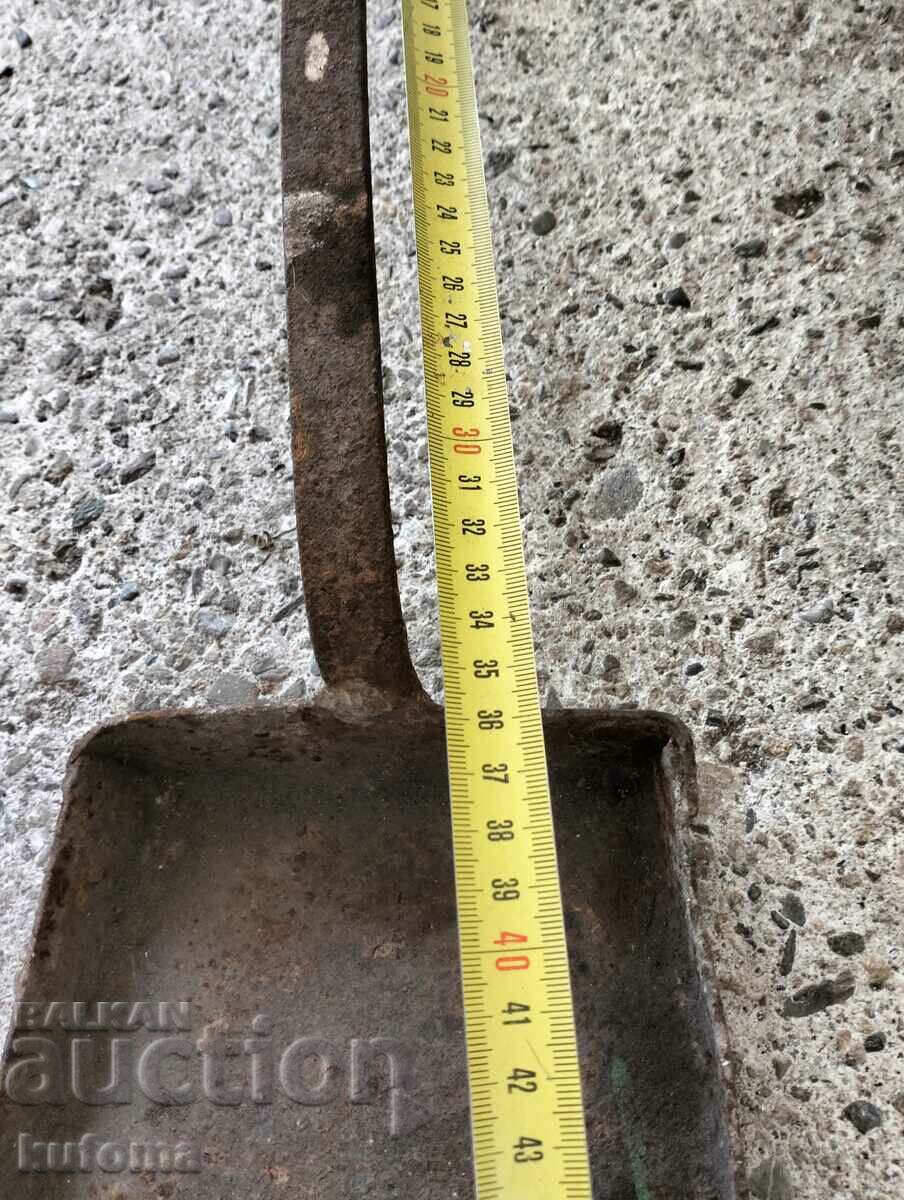 Delivery of An old iron shovel Delivery of An old iron shovel