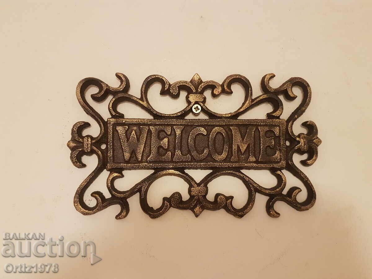 Cast iron WELCOME sign