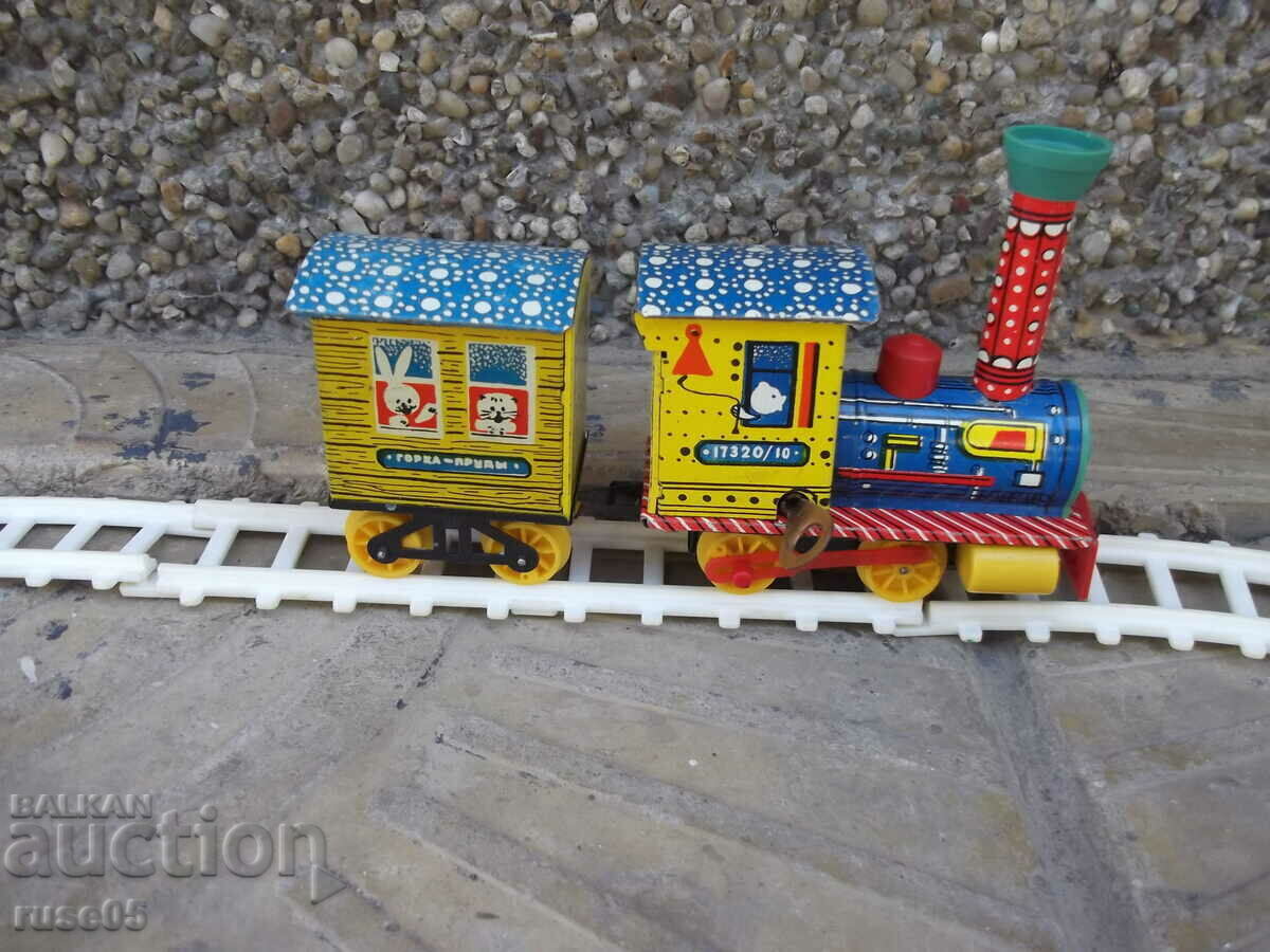 Auction Locomotive with winding, wagon metal and rails working Soviet Auction Locomotive with winding, wagon metal and rails working Soviet