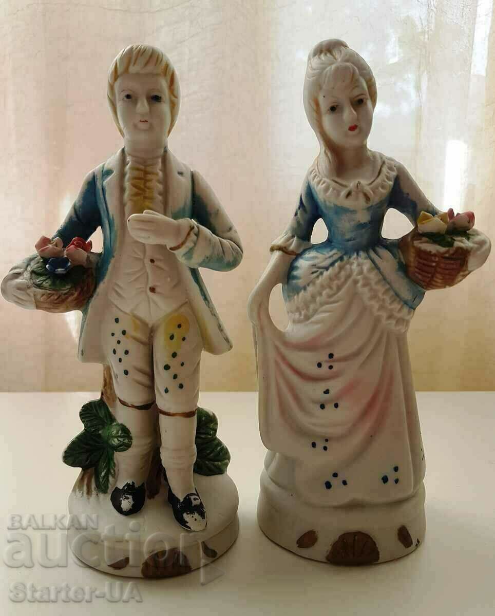 A beautiful pair of porcelain figurines.