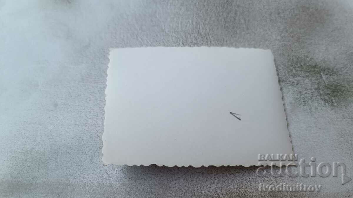 Photo Auschwitz Man in front of the entrance to the Concentration Camp with price 2.35 BGN | € 1.20 Photo Auschwitz Man in front of the entrance to the Concentration Camp with price 2.35 BGN | € 1.20