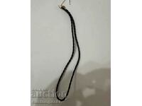 Leather necklace with gold clasp, sample 585