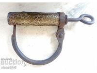 Antique prison shackle with key