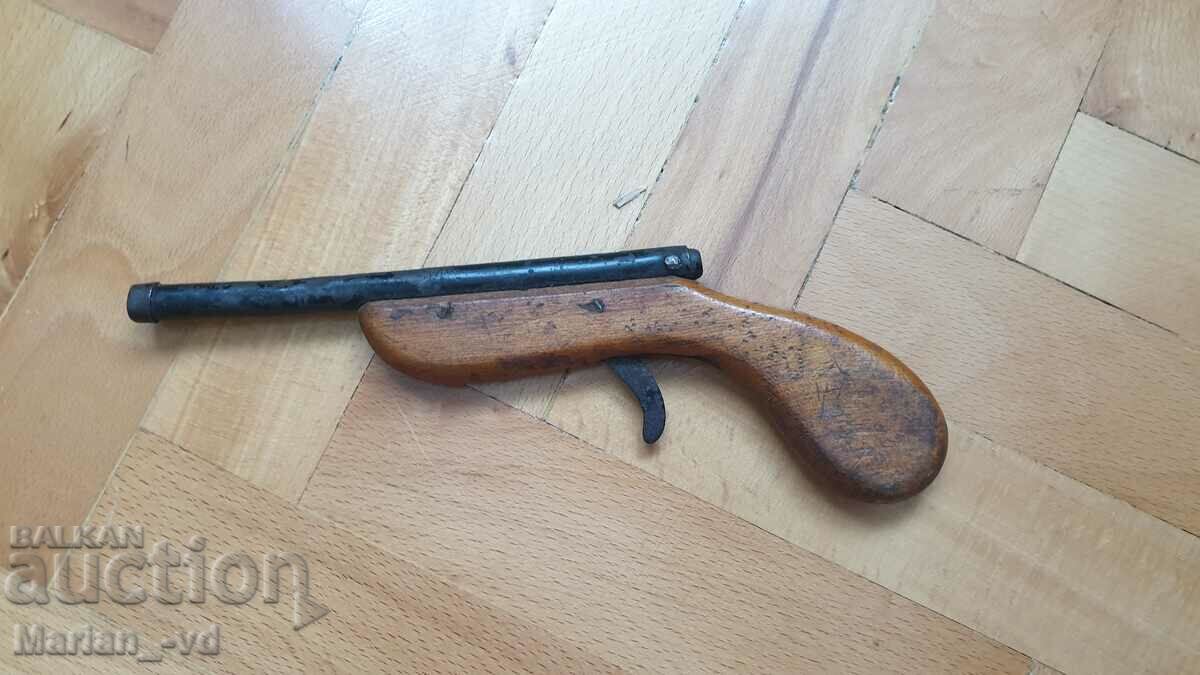 Pistolă veche de jucărie din lemn