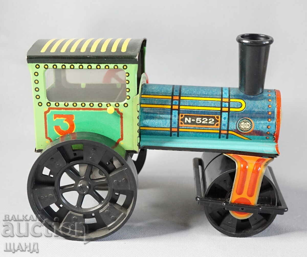 Old Czech mechanical metal toy roller model