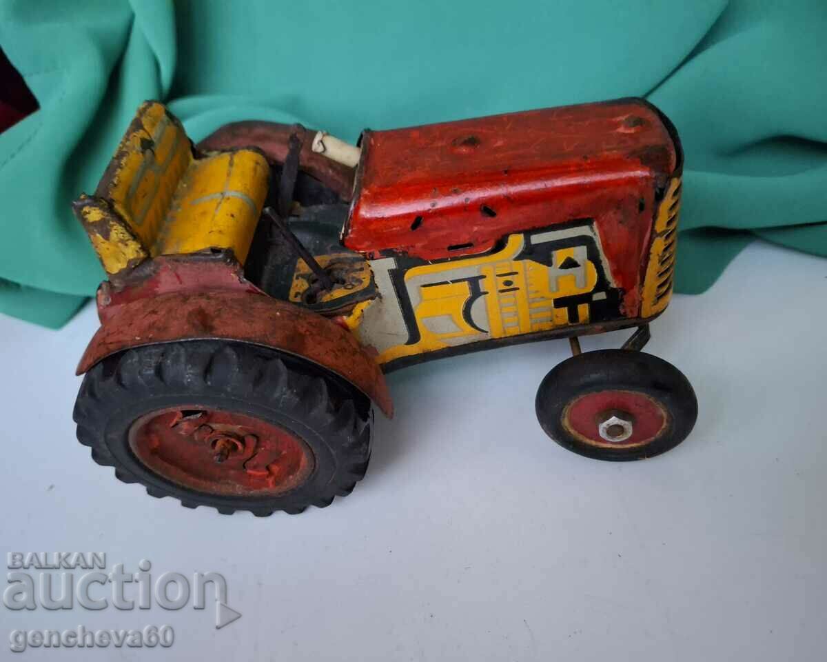 Old children's tin tractor