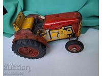 Old children's tin tractor