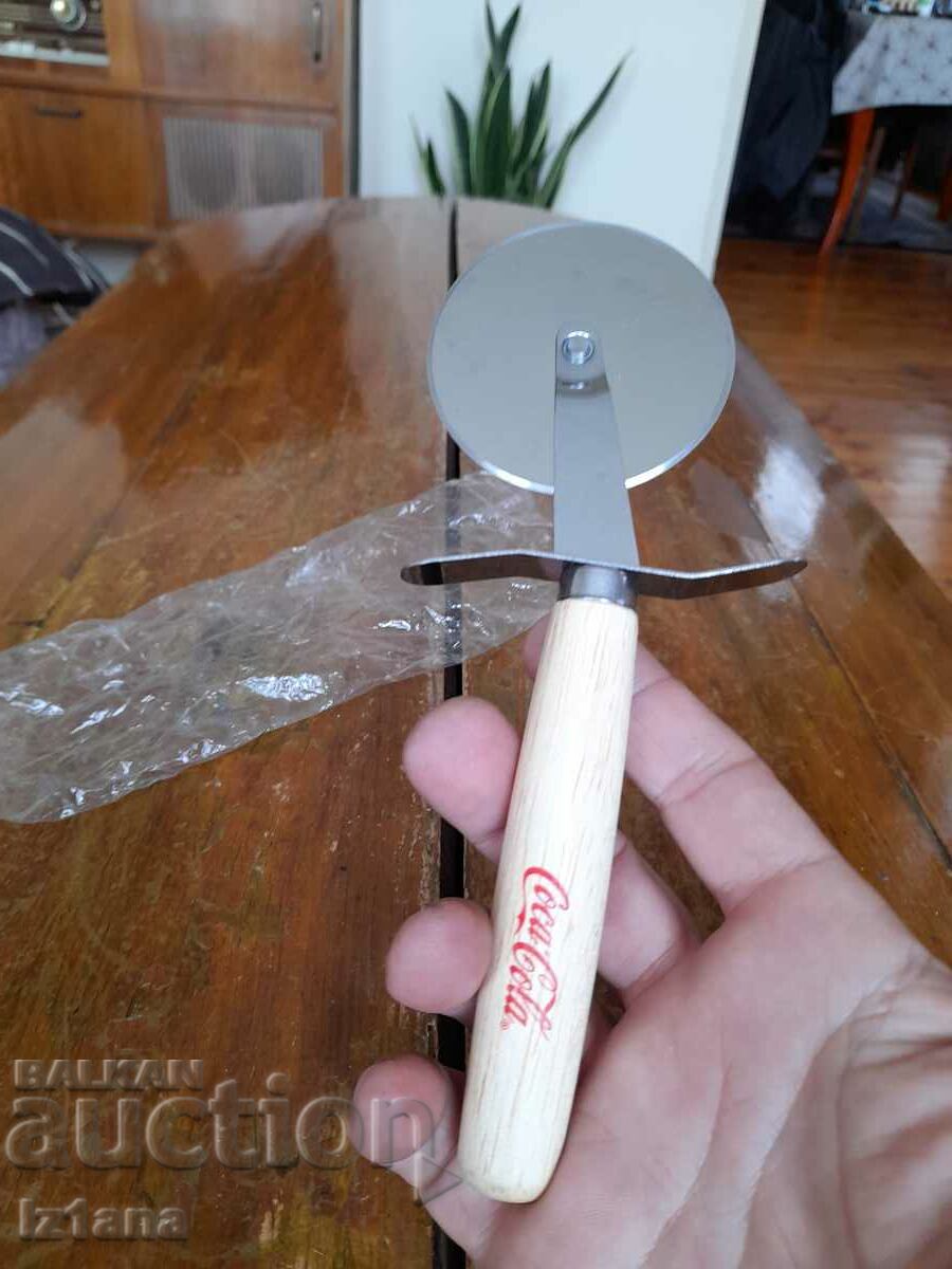 Coca Cola pizza knife, Coca Cola with price 22.00 BGN | € 11.25 Coca Cola pizza knife, Coca Cola with price 22.00 BGN | € 11.25