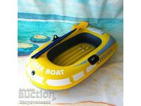 Single seater inflatable rubber boat with protection, pump and oars