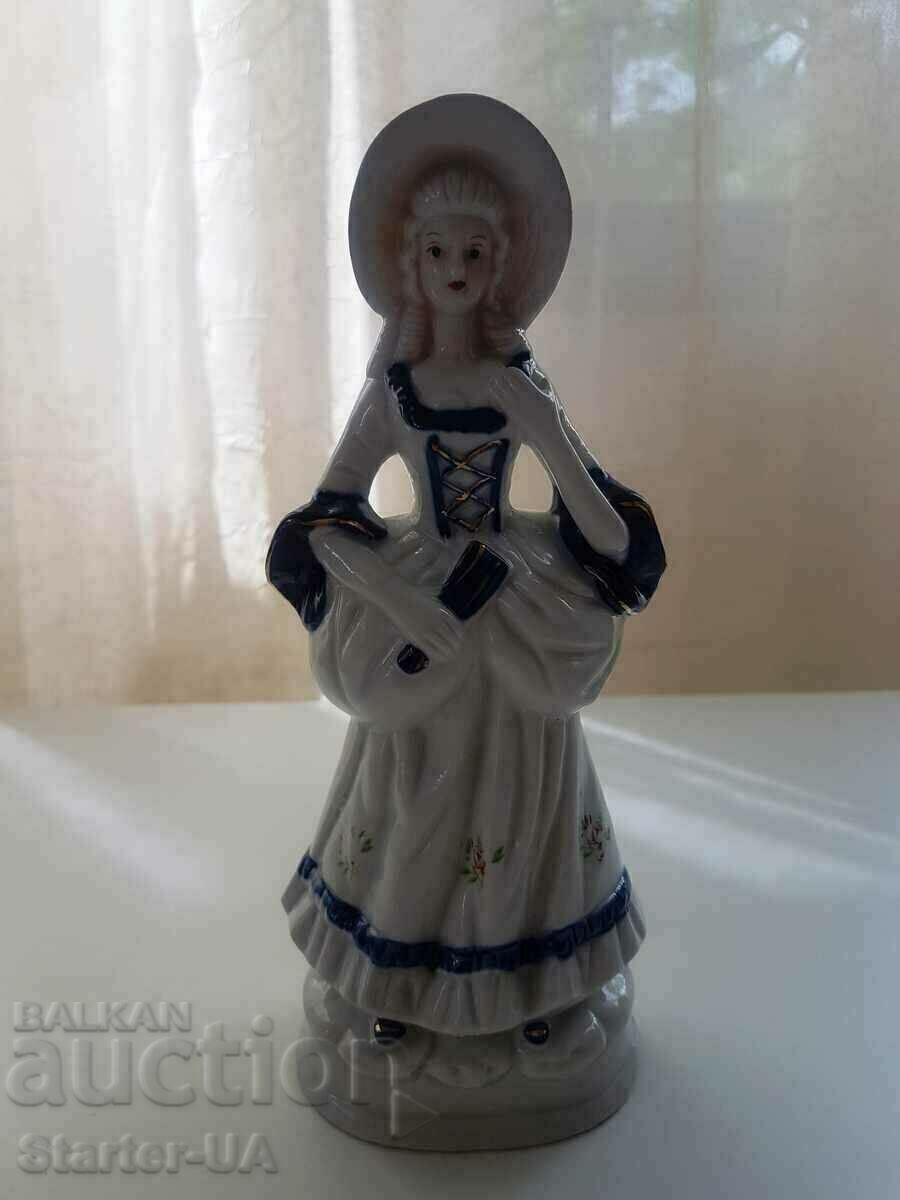 A beautiful porcelain lady. Not marked.