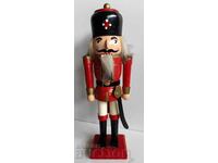 A LARGE NUTCRACKER HUSSAR SOLDIER HARDLY OPENS MOUTH