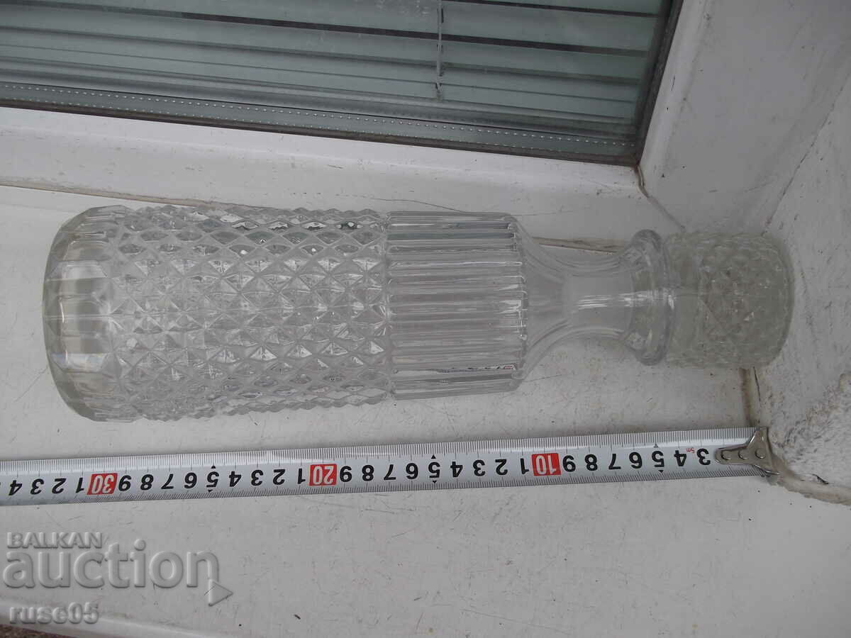 Auction Embossed glass bottle for alcohol - 1 Auction Embossed glass bottle for alcohol - 1