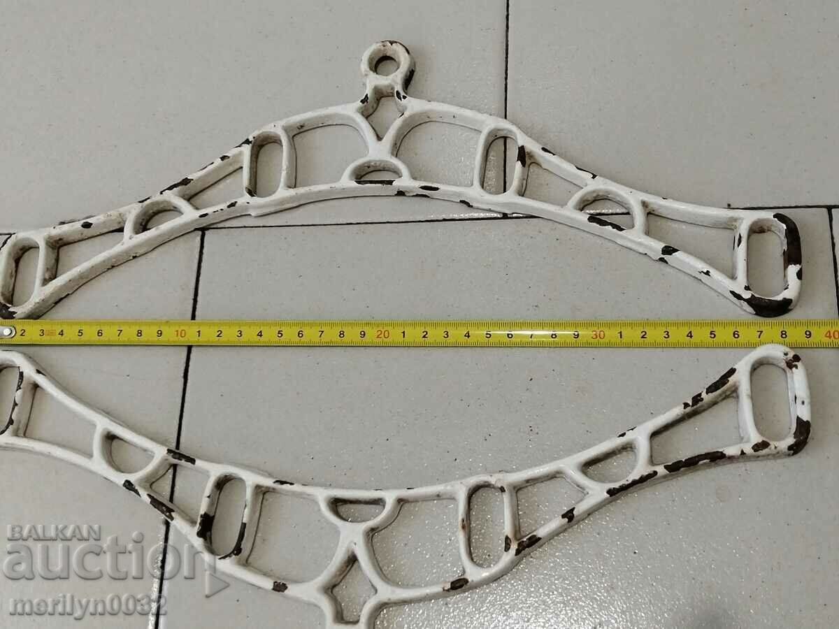 Auction Two cast iron racks embossed cast iron Auction Two cast iron racks embossed cast iron