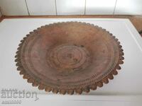 A large copper plate.