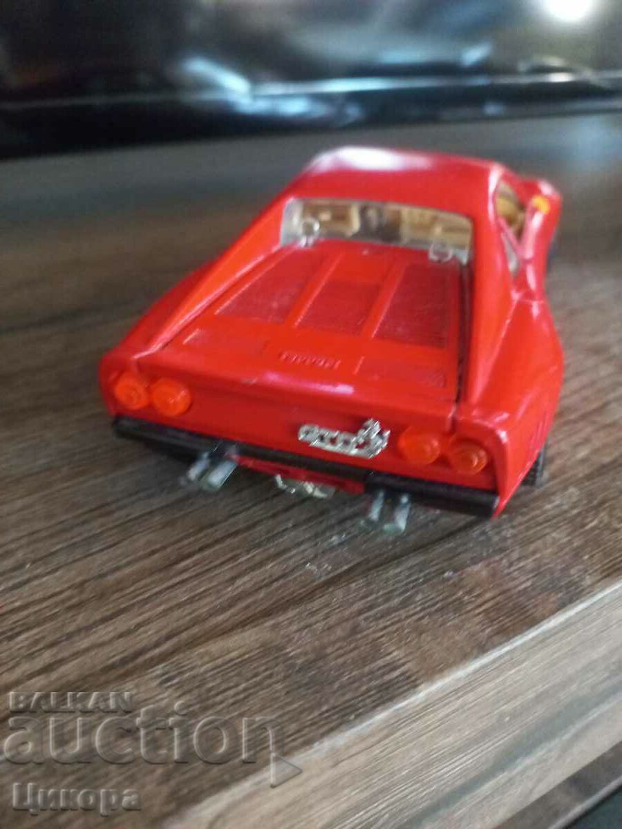 Auction METAL TROLLEY FERRARI GTO 1984 BURAGO 1/24 Auction METAL TROLLEY FERRARI GTO 1984 BURAGO 1/24