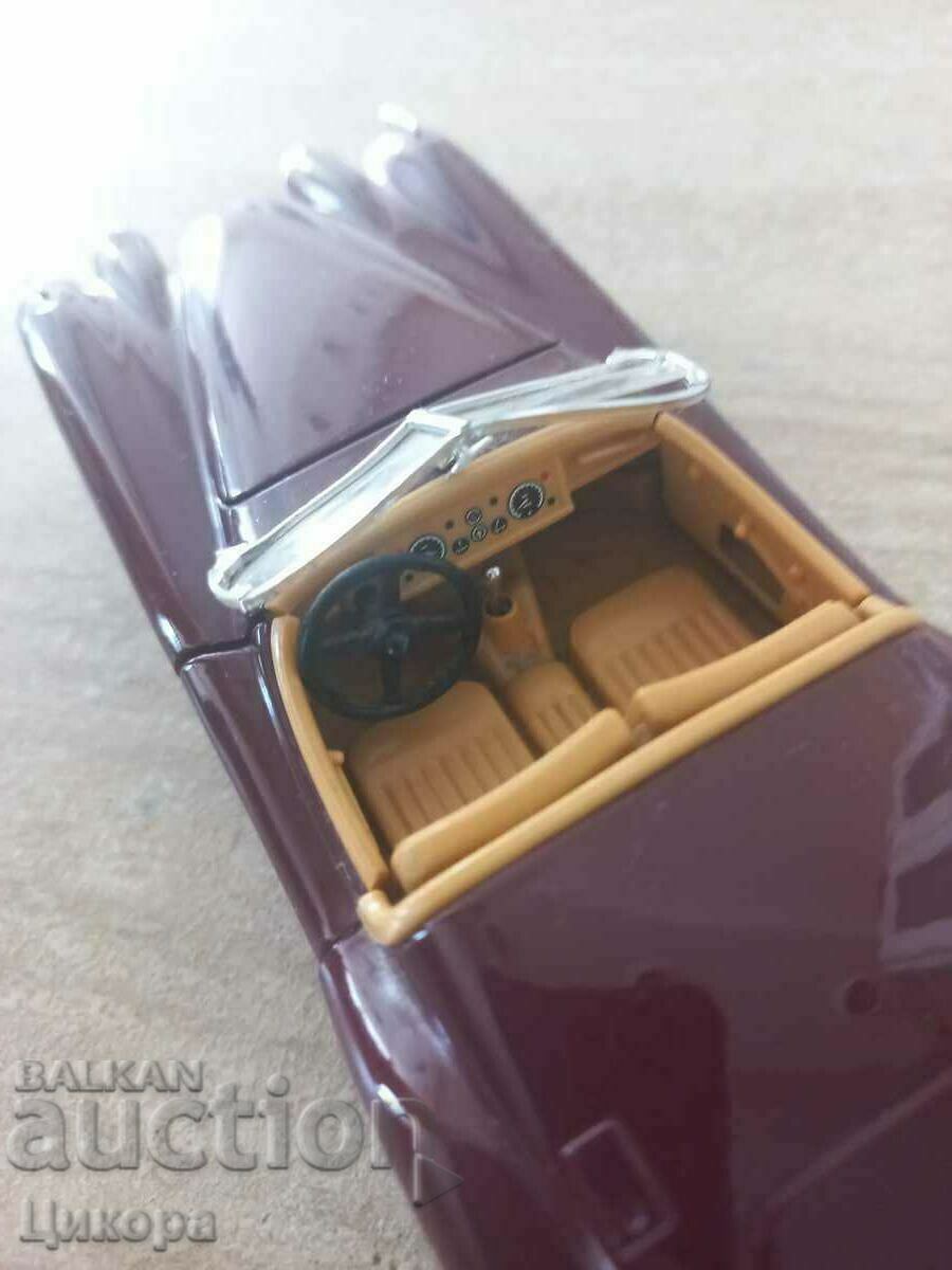 Auction METAL TRUCK JAGUAR XK 12O 1948 BURAGO 1/24 Auction METAL TRUCK JAGUAR XK 12O 1948 BURAGO 1/24