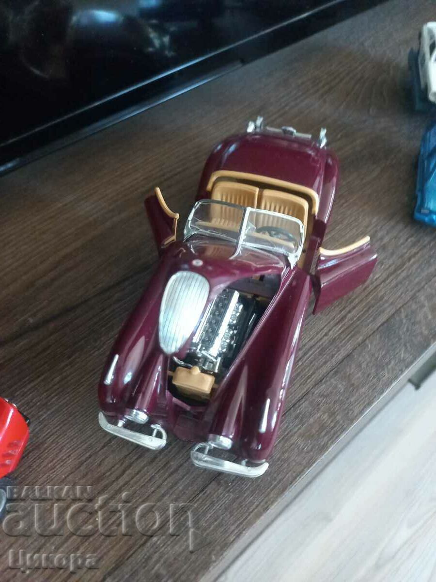 Delivery of METAL TRUCK JAGUAR XK 12O 1948 BURAGO 1/24 Delivery of METAL TRUCK JAGUAR XK 12O 1948 BURAGO 1/24