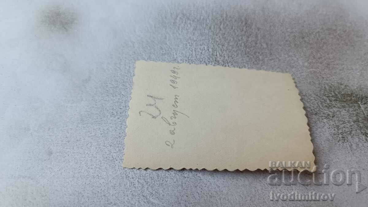 Photo Man, woman and boy next to a boat on the seashore 1949 with price 1.45 BGN | € 0.74 Photo Man, woman and boy next to a boat on the seashore 1949 with price 1.45 BGN | € 0.74