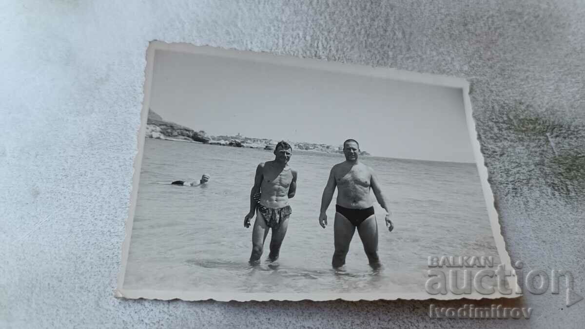 Photo Burgas Two men in swimsuits on the beach