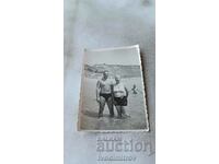 Photo Burgas Man and woman on the seashore