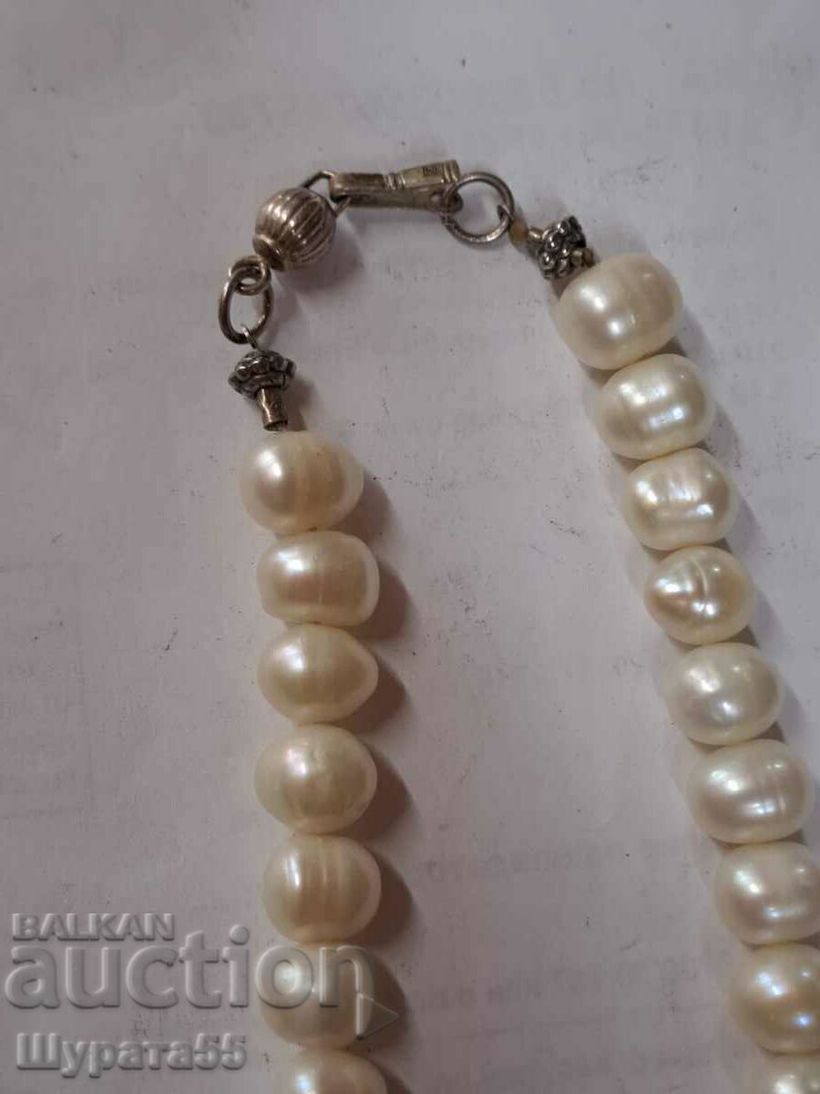 Pearls and silver 44cm. Pearls and silver 44cm.