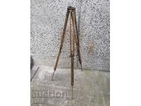 I am selling a very old antique wooden camera tripod d
