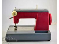 Metal and plastic sewing machine, children's toys, social