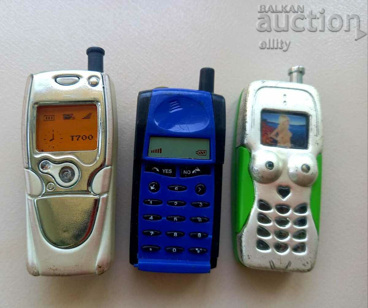 Three lighters, imitations of GSM