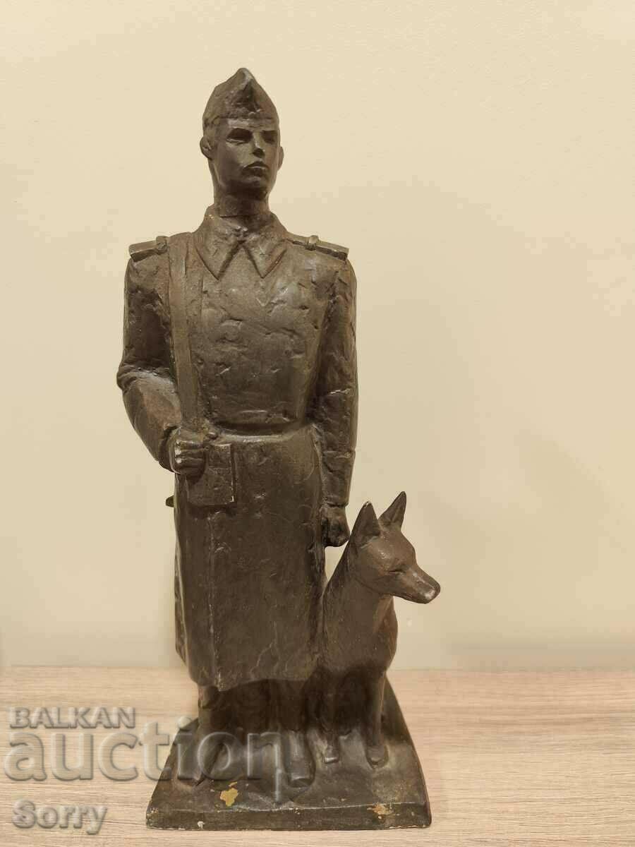 Sculpture Border guard with a dog