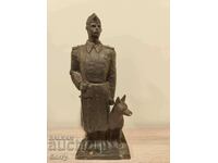 Sculpture Border guard with a dog