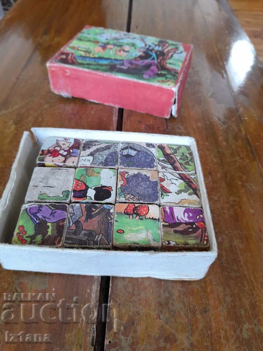 An old children's game with cubes with price 32.00 BGN | € 16.36