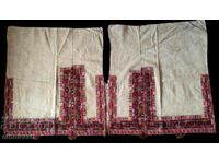 A pair of embroidered debar sleeves