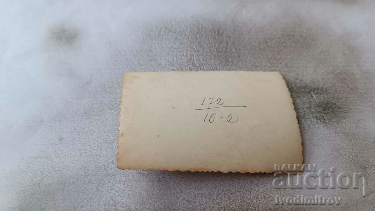 Photo Sofia A woman in a winter coat in front of the Courthouse with price 1.85 BGN | € 0.95 Photo Sofia A woman in a winter coat in front of the Courthouse with price 1.85 BGN | € 0.95