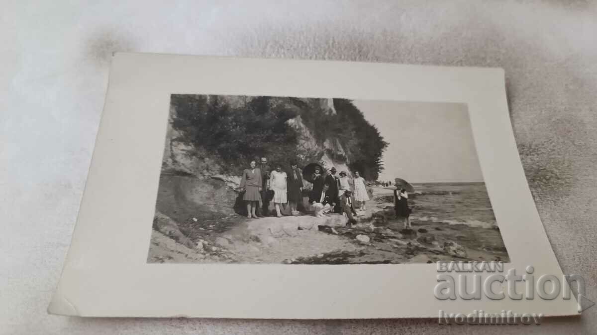 Φωτογραφία Βάρνα Άνδρες και γυναίκες στην παραλία
