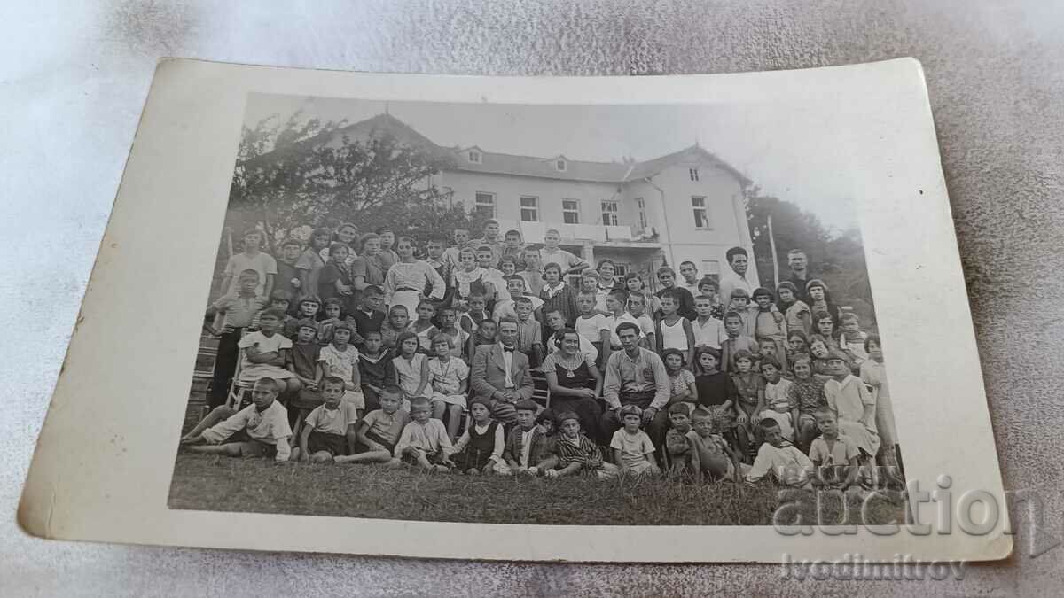 Photo Lovech Pupils with their teacher in front of the school, 1935