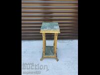 Beautiful wooden stand with marble tops