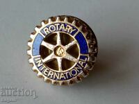A unique badge. Rotary Club.