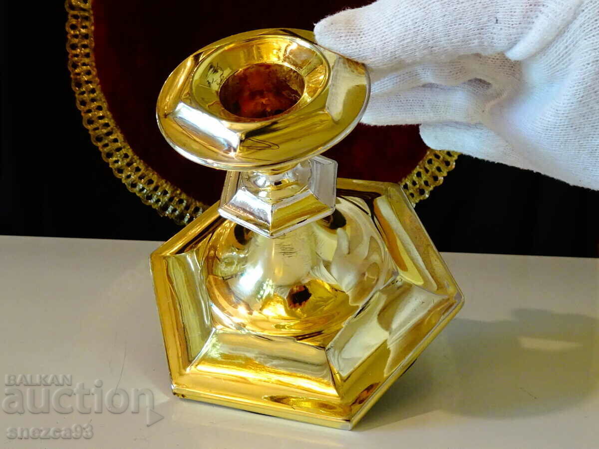 Auction  German candlestick, gold-plated, 330 g.