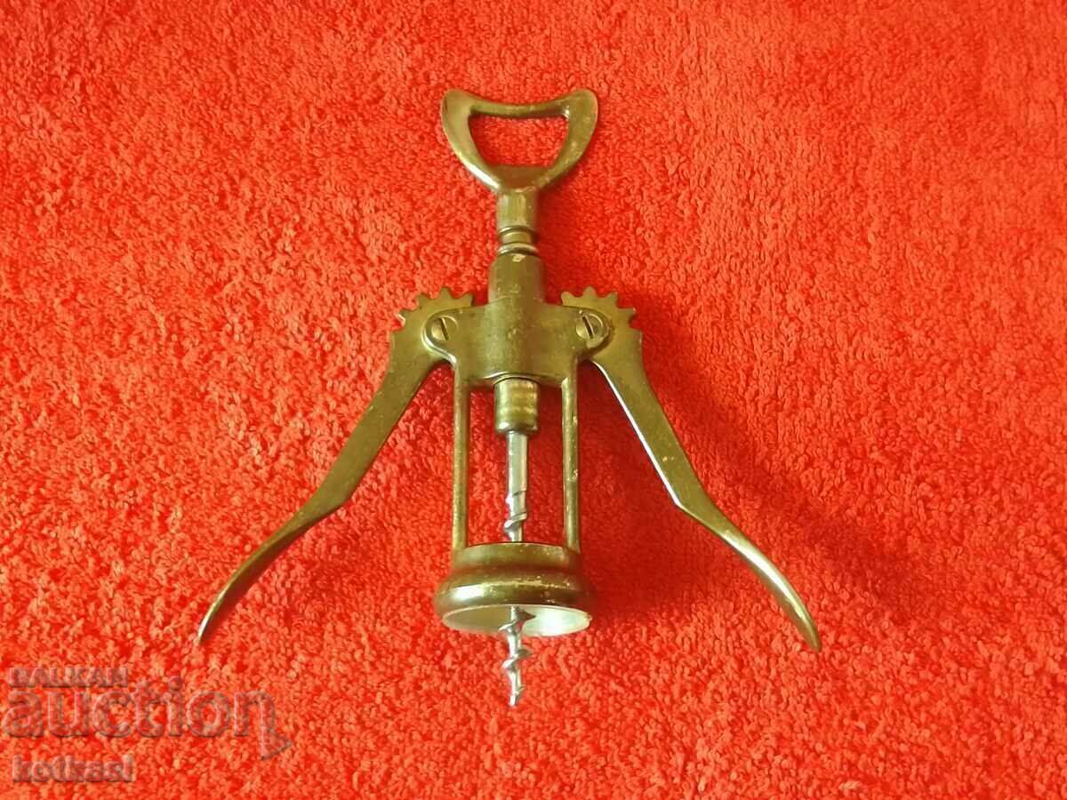 Auction Old metal corkscrew with two arms Auction Old metal corkscrew with two arms