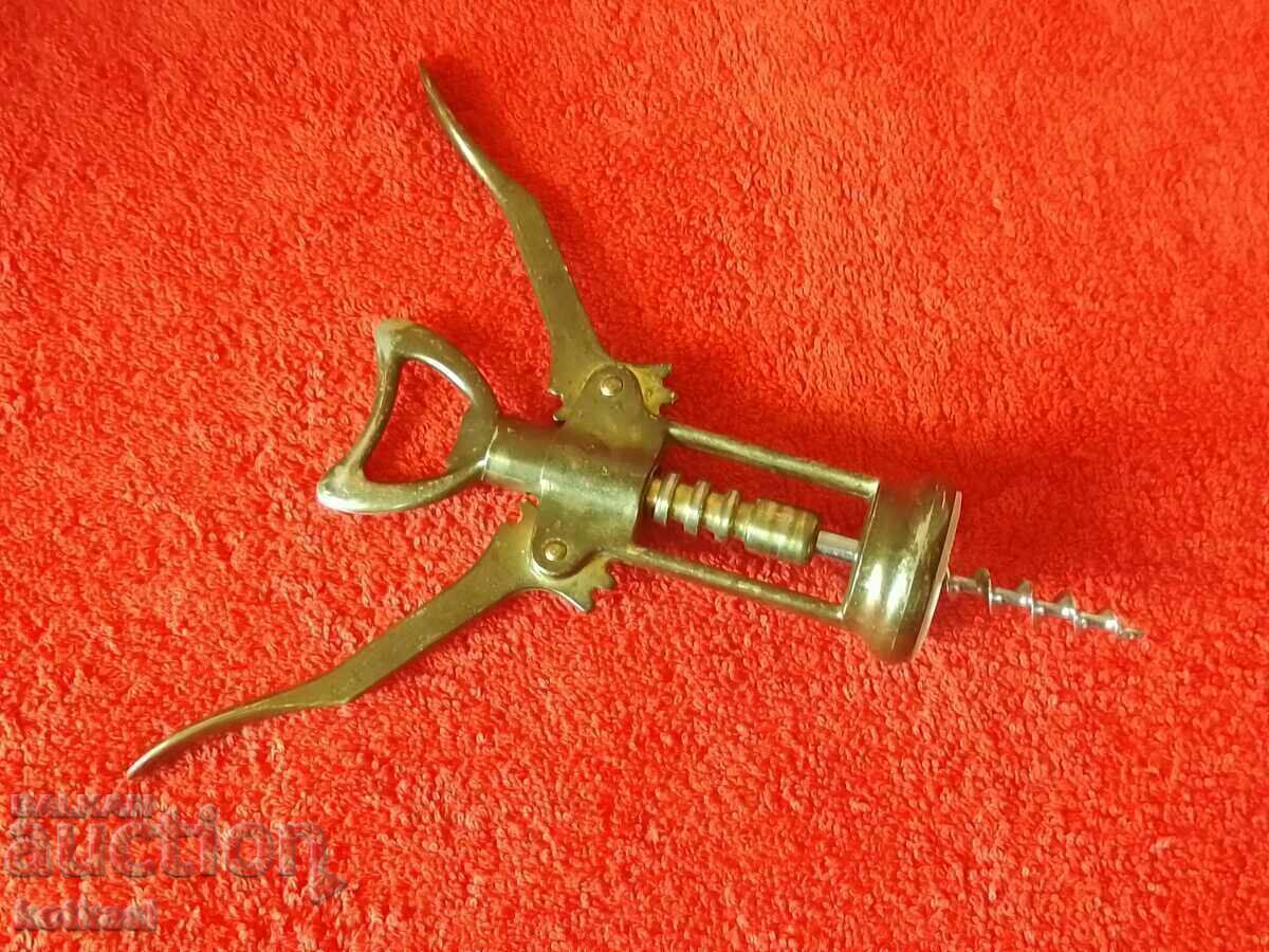 Delivery of Old metal corkscrew with two arms Delivery of Old metal corkscrew with two arms