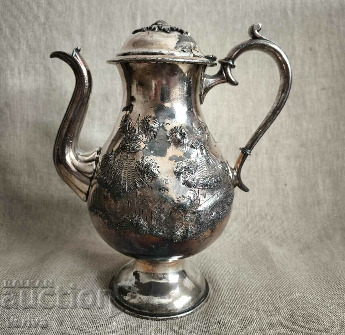 Old large silver plated English teapot.