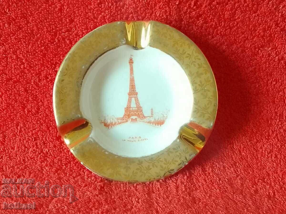 Porcelain ashtray gilt Eiffel Tower LIMOGES Franse with price 10.50 BGN | € 5.37 Porcelain ashtray gilt Eiffel Tower LIMOGES Franse with price 10.50 BGN | € 5.37