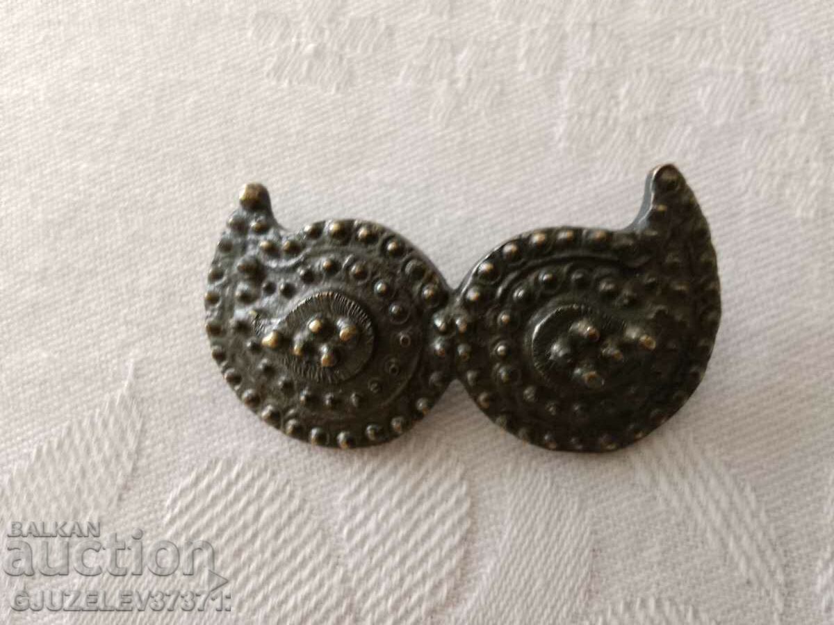 Old brooch, bronze jewelry